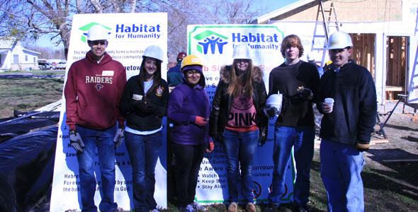 Rouse Habitat members help build second home