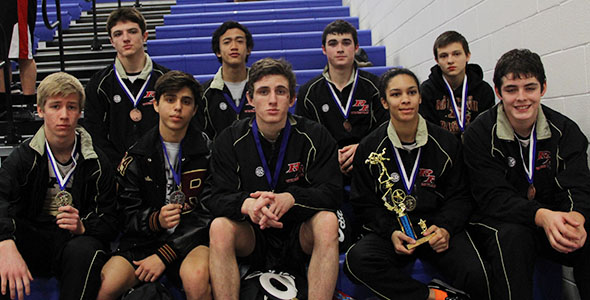 12 wrestlers place at district, 9 headed to regionals