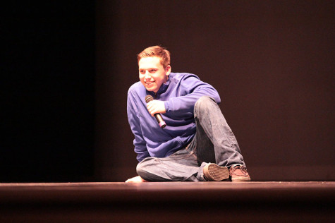Senior Blake Carter smiles winningly as he performs at the Mr. Maroon talent show.