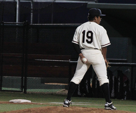Devin Tucker pauses before delivering the pitch in the Vandegrift game.