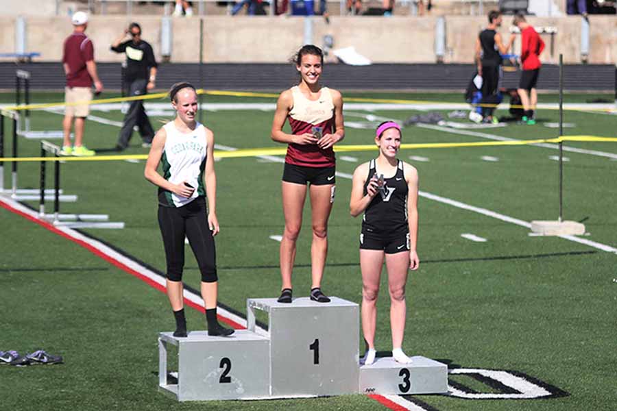 Abby Lentz won the 400 meter dash at district and area.