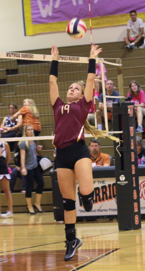 Senior Taylor Black sets the ball during the Westwood match, Sept. 26. 