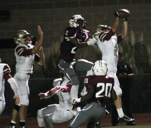 In the end zone, Taylor Looney intercepts a Round Rock pass.