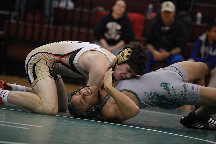 Brock Catchpool wrestles in the 138 weight class at Senior Night, Jan. 21. Catchpool won the match.