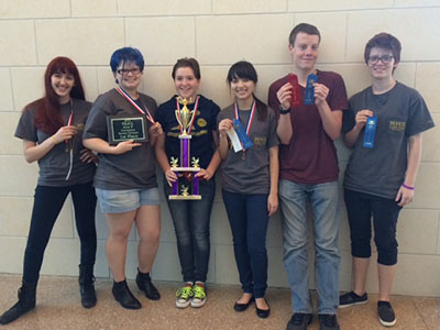 Latin team members show off their ribbons and trophies Feb. 20 from their competition at St. Andrews Episcopal School.