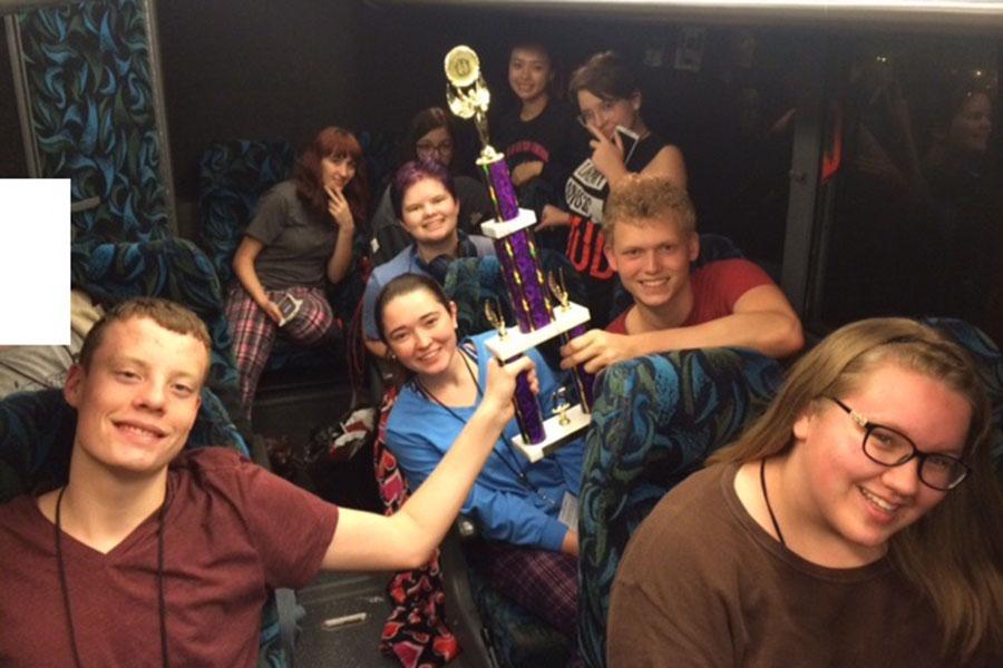 The Latin Club shows off their trophy from the state competition  in Amarillo.