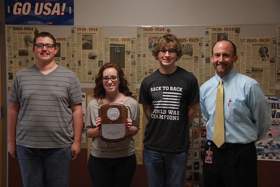 Austin Finn, Lauren Shuffield and Brandon Walker were part of the Social Studies team that finished first at district. At right is Social Studies coach Michael Hjort.