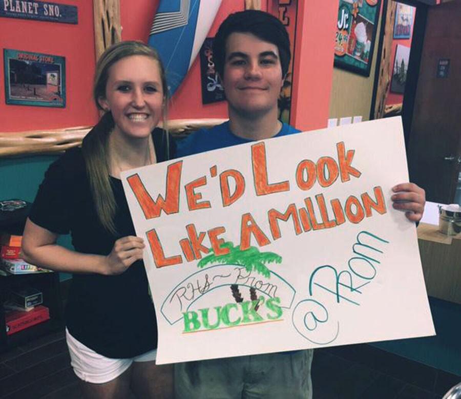 Junior Alan Orwick asked Cedar Parks Ally Gamble to prom at work, Bashama Bucks. Orwick gave her a snow cone when he showed Gamble the sign he created.
