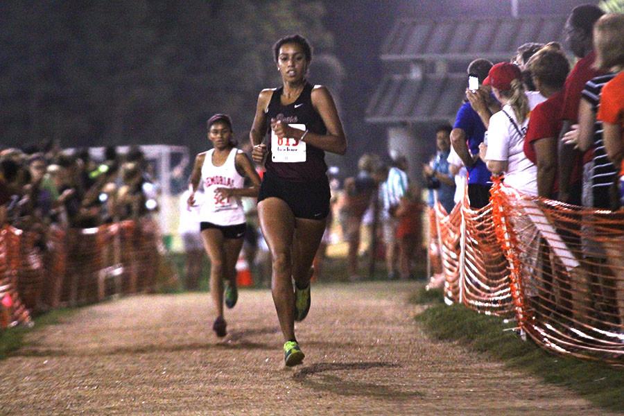 Madie Boreman heads to the finish line at Friday Night Lights.