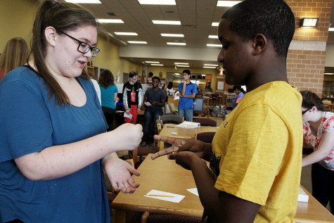 Bekah Turner and Earl Beechum play a game during ARC's meeting, Oct. 7.