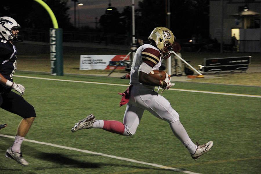 Senior Marquis Simmons scores in the McNeil game.