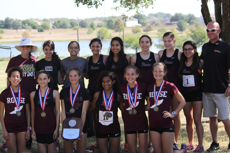 The varsity girls defended their district title Thursday, Oct. 15.