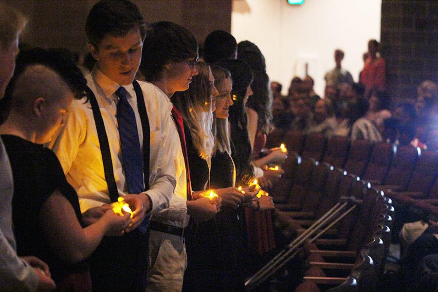 National Honor Society inductees light their candles during the induction ceremony, Nov. 3.