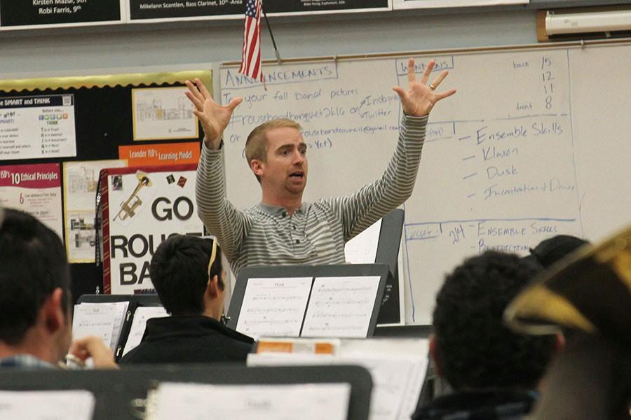 The new band director, Jeremy Spicer, leads his class sixth period.