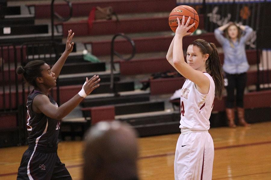 In the Round Rock game, senior Hannah Detrich looks for an open opponent. 