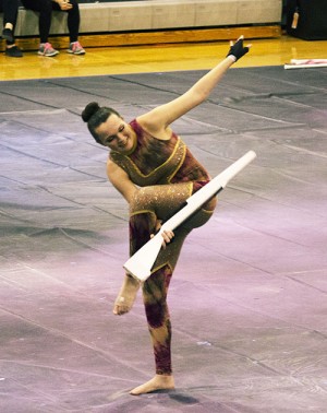 Rachel Firkins twirls a rifle during the competition at Cedar Park.