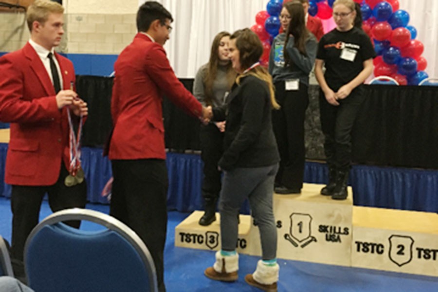 Four place in Cosmetology events at Skills USA district