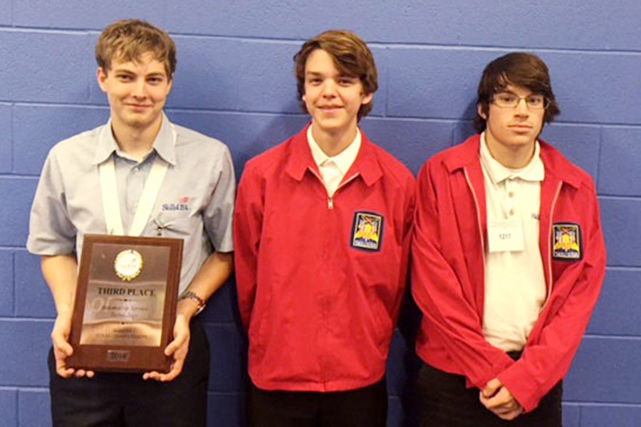Alex Eiband, Wesley Black and Ryan Hage competed at Skills USA state in April. Eiband (left) took third in state in Automotive Service Technology.