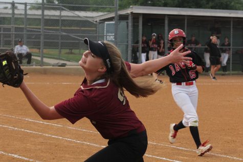 Cassidy Morgan holds on to a foul ball for the out in the Bowie playoff game.