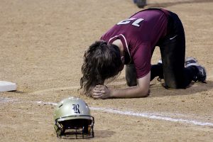 Senior Gabi Lopez reacts to being called out at first base in the seventh inning of the Bowie playoff game. It was the final out to end the first round game.