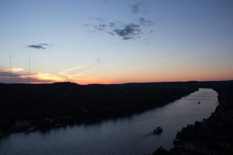 The sun sets beautifully on Mount Bonnell.