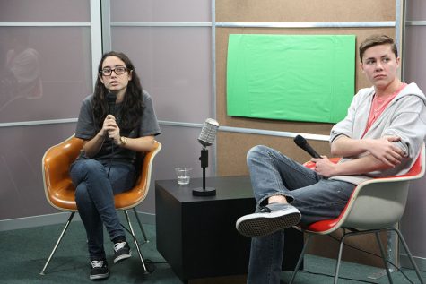 At an afterschool workday, Abby Acosta and Grant Haden prepare to anchor.