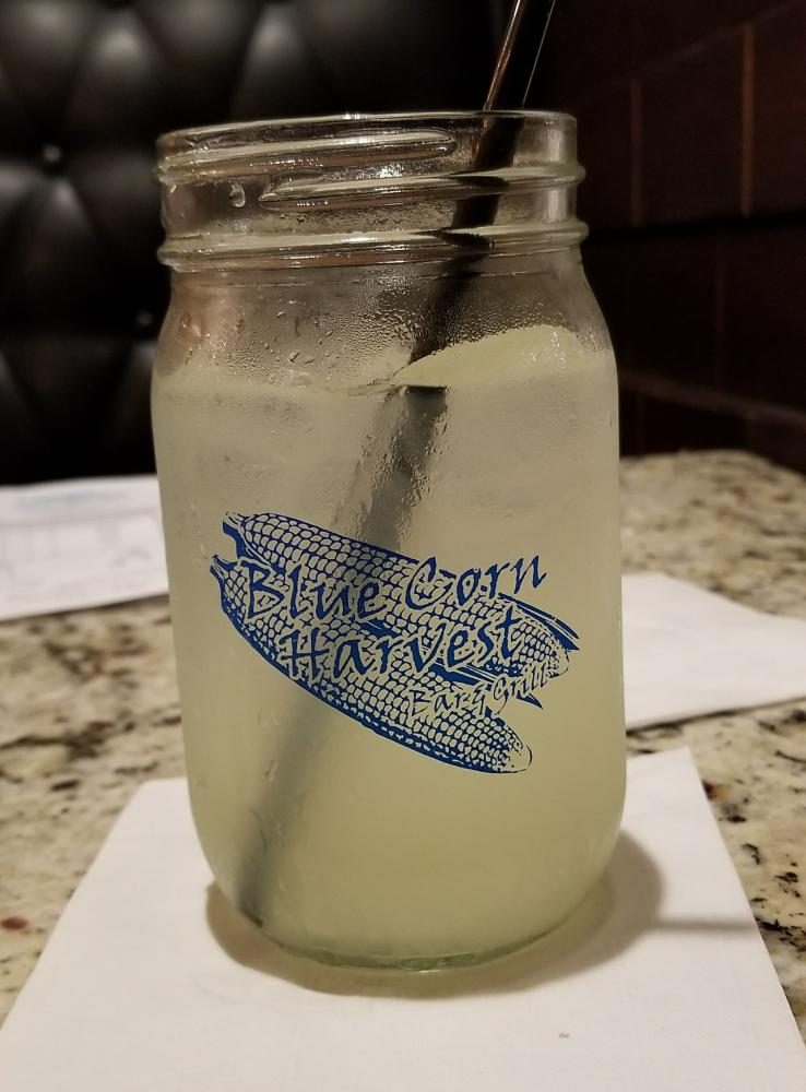 Blue Corn Harvest logo on a glass of lemonade 