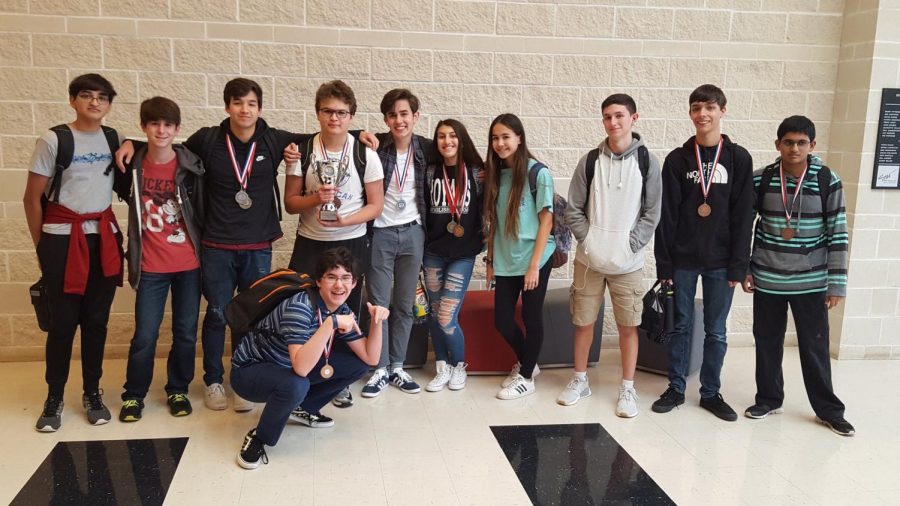 At their first practice meet Oct. 20 at Belton HS, several UIL academic team members take a picture with the medals they won. Students earned enough points in all events combined to bring home the Sweepstakes award. 