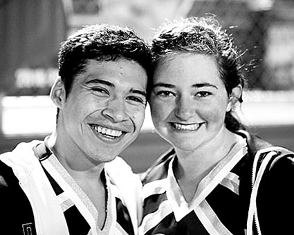 Seniors Drew Padilla and Jasmine King share a smile before the Hutto football game.