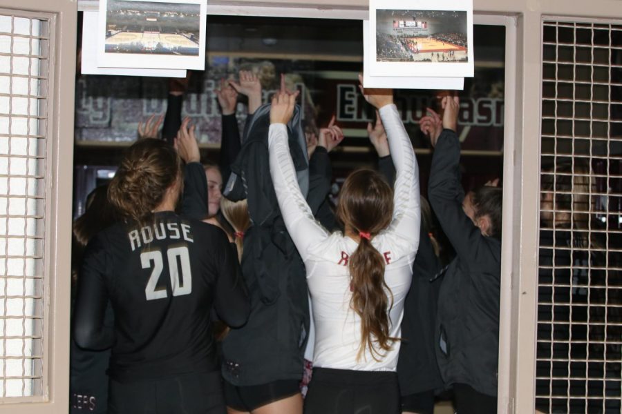 Varsity volleyball gets pumped up before a game with a dance party in the locker room. 