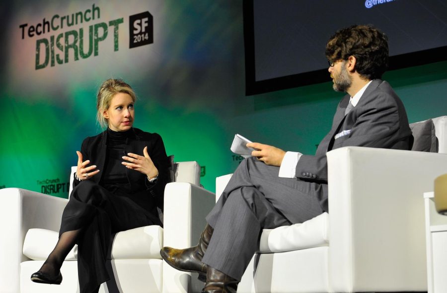 Theranos founder, Elizabeth Holmes speaks on stage at a tech conference.