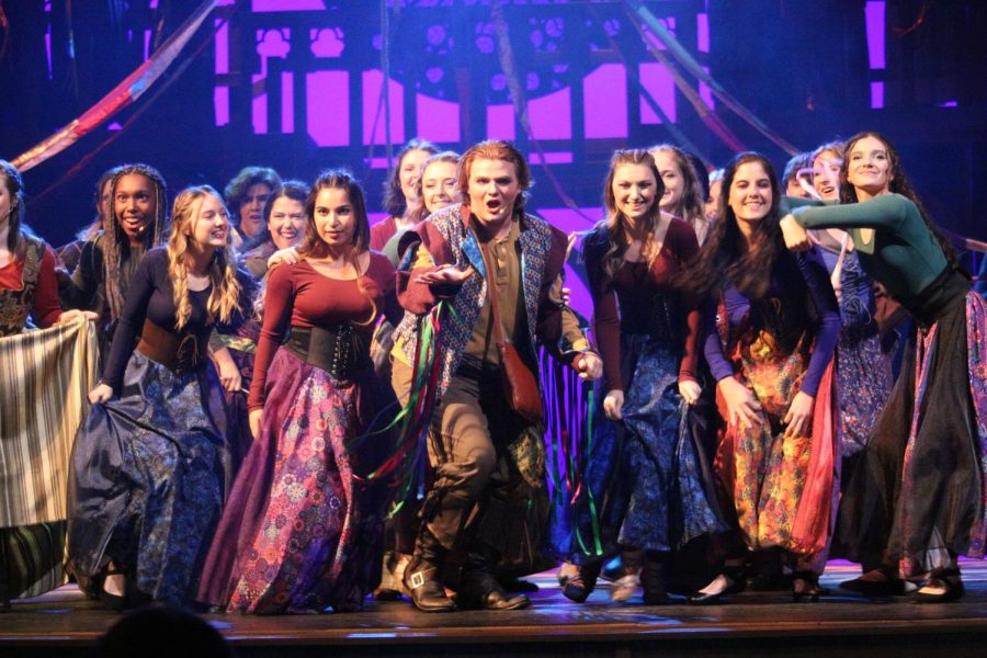 Clopin and the Romani gypsies of Paris dance together in ‘Topsy Turvy.’ 