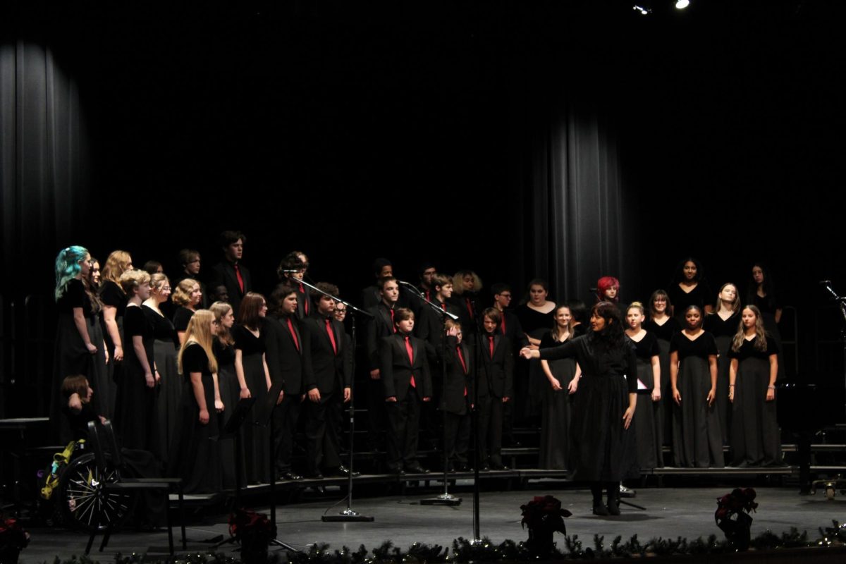 Choir sings classic Christmas songs. 
