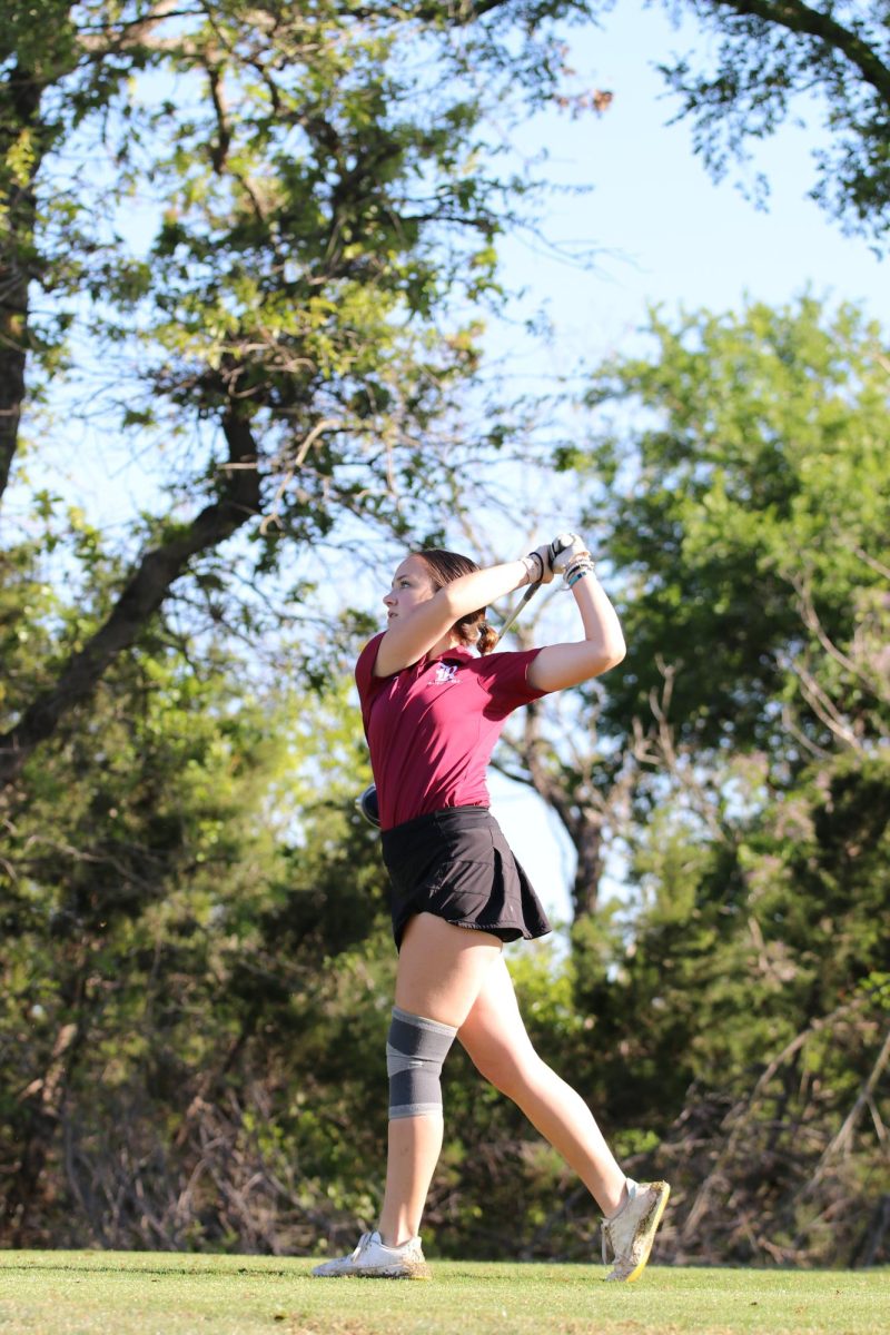 Focused on sending the ball over and across the bridge, junior Dakota Brewster tees off. Brewster shot a 76 on day one, her lowest round yet in the season. “After day one [at district], we were really confident that we were going to take the championship,” Brewster said. “It was the happiest I’ve ever seen our team and the closest we’ve ever been. It was euphoric.”