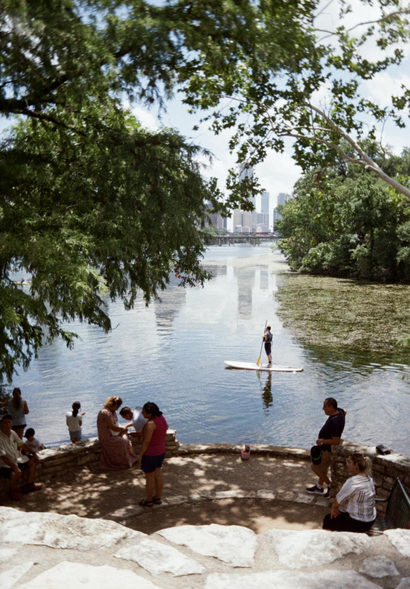While on a hike at the Zilker Park trail, Zayed decides to snap a shot of a man on a canoe. 