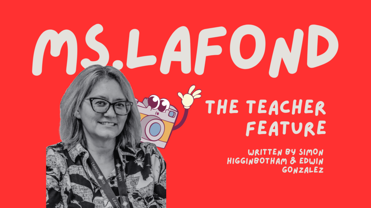 Taking out the set of class cameras, new Audio and Visual teacher Lisa Lafond, welcomes students as they enter the class.