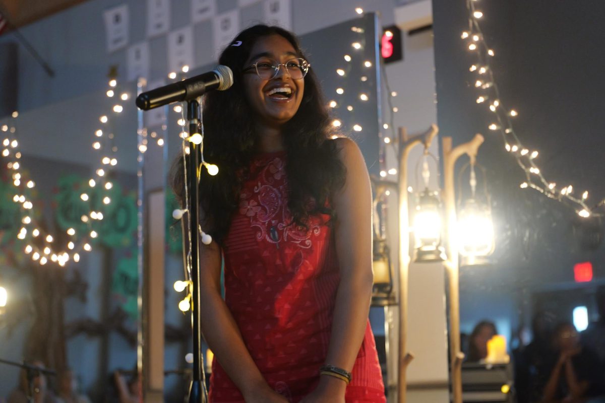 Junior Anina Thomas delivers a performance at choir's annual fall Solo House.